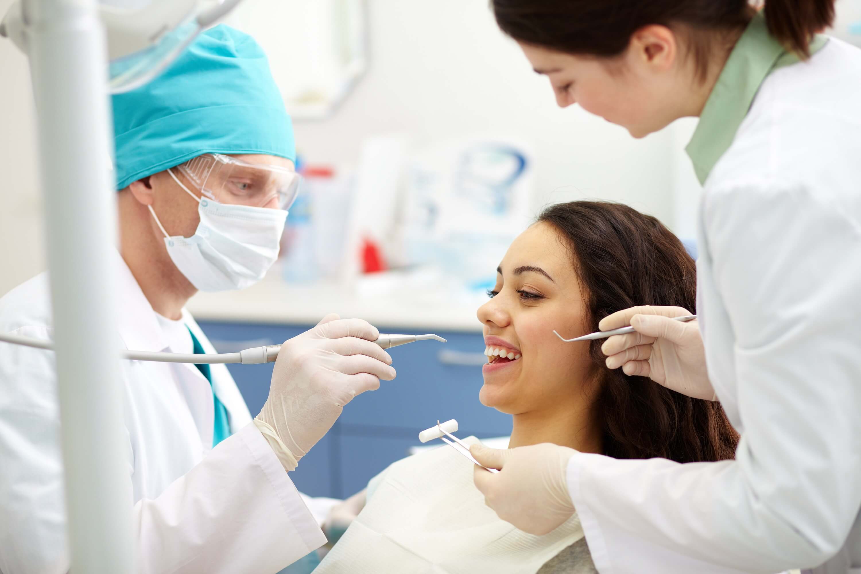 dentist-examining-patient-s-teeth (1)